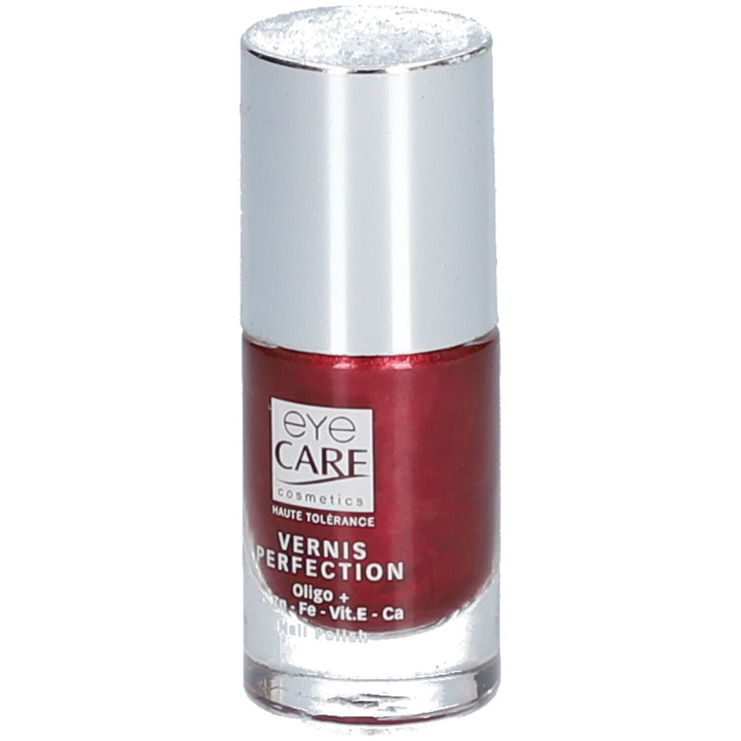Flacone di smalto con tappo argentato. Scritta: Eye Care Cosmetics, Vernis Perfection, colore rosso rubino.
