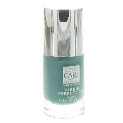 Flacon de vernis à ongles vert avec bouchon argenté. Étiquette "eye CARE" et "Vernis Perfection".