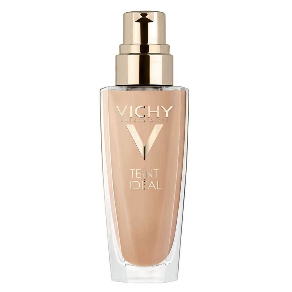 Vloeibare foundation in glazen fles met gouden pomp. Vichy-logo en tekst Teint Idéal.