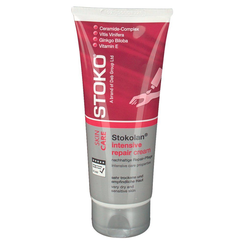 Face avant du tube de crème STOKOLAN® Intensiv-Reparierende Creme. Design rouge et blanc. Inscription: Intensiv repair cream. Pour peaux très sèches et sensibles.