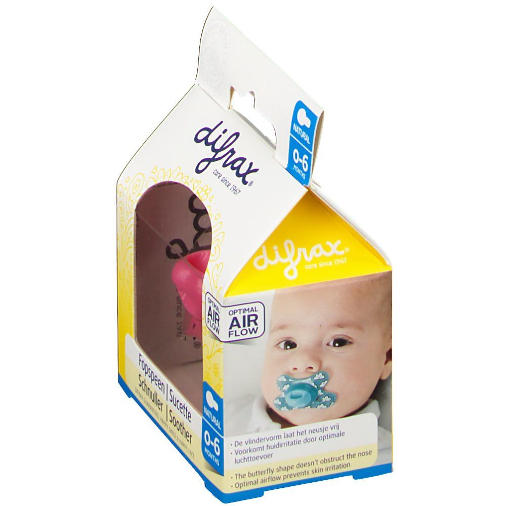 Emballage avec sucette rose. Visible: marque, nom du produit, recommandation d'âge 0-6 mois, et visage de bébé.