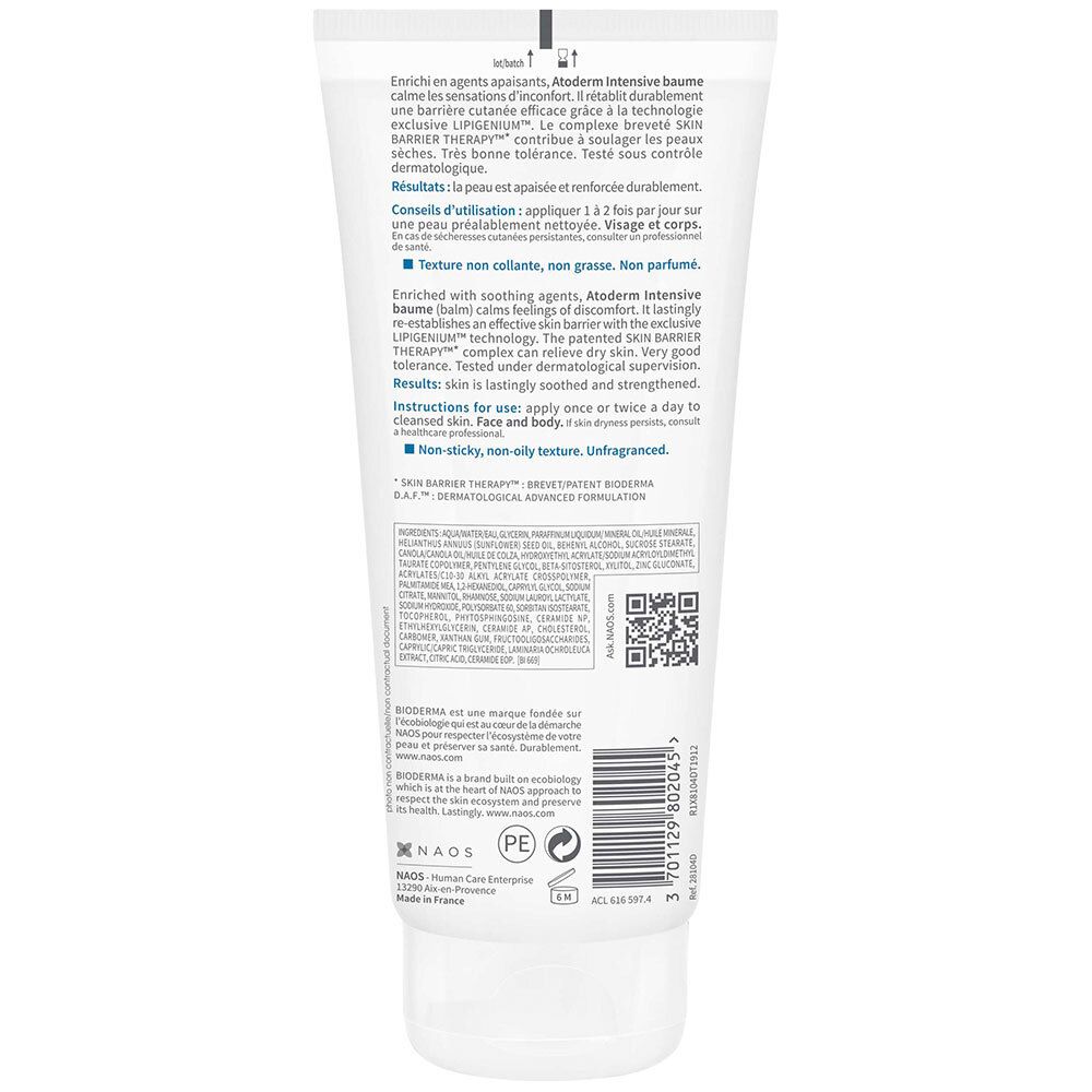Achterkant van een witte tube. Tekst in meerdere talen. QR-code en logo's. Informatie over gebruik en ingrediënten.
