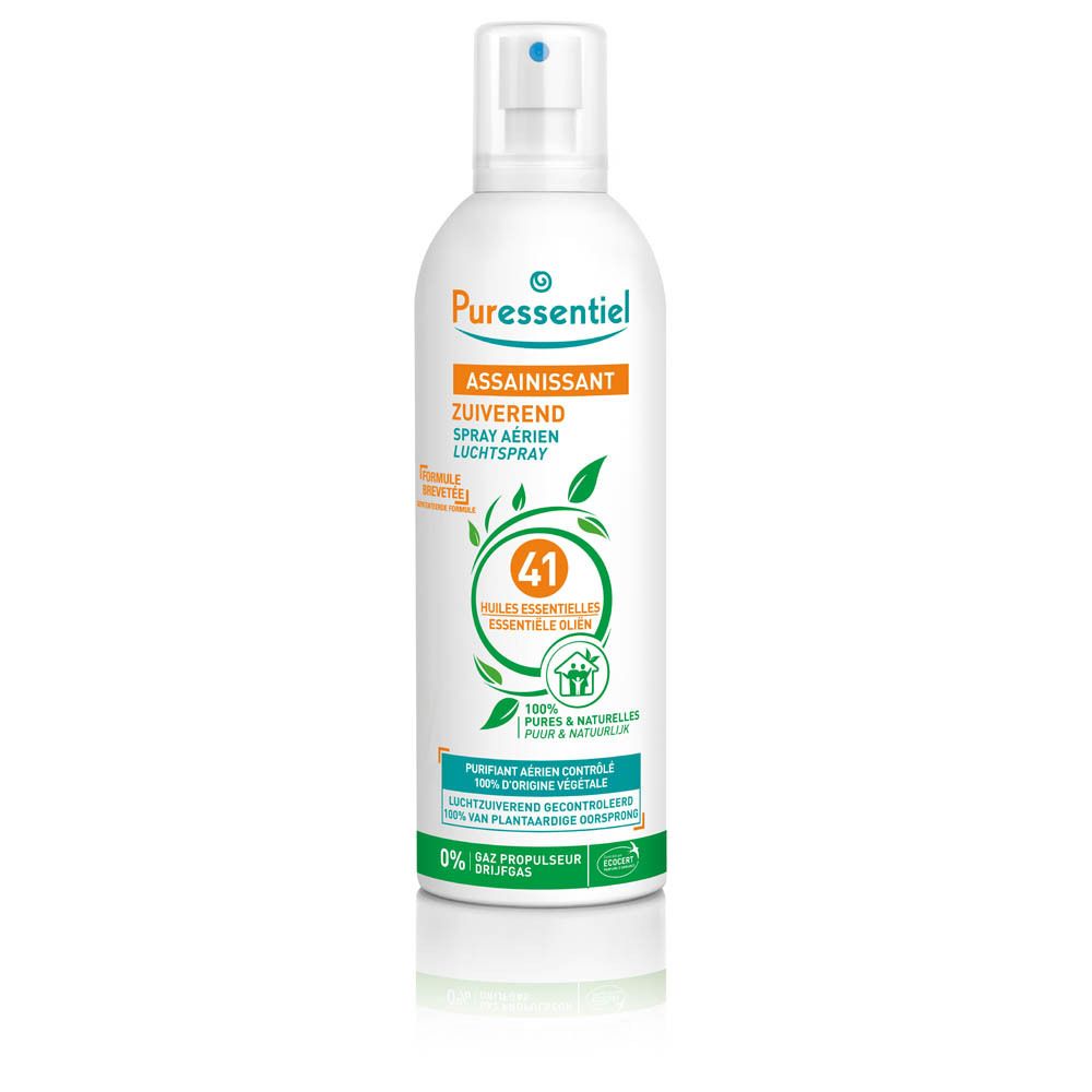 Wit spray met oranje etiket. Tekst: Puressentiel, Assainissant, 41 Huiles Essentielles. Groene bladeren.
