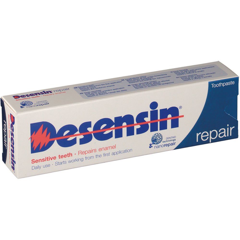 Boîte de dentifrice Desensin Repair. Blanc, bleu et rouge. Inscription : Desensin, repair. Pour dents sensibles.