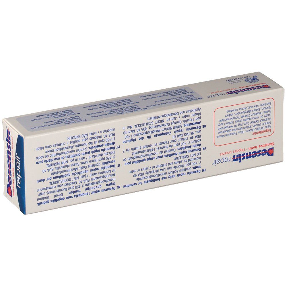 Dos de la boîte de dentifrice Desensin Repair. Texte multilingue. Blanc, bleu et rouge. Inscription : Desensin, repair.