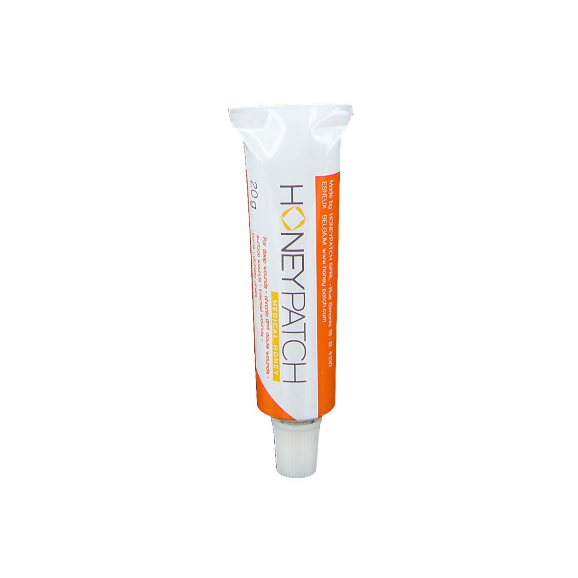 Tube honing. Wit-oranje ontwerp. Opschrift: Honeypatch. 20g. Steriele medische honing.
