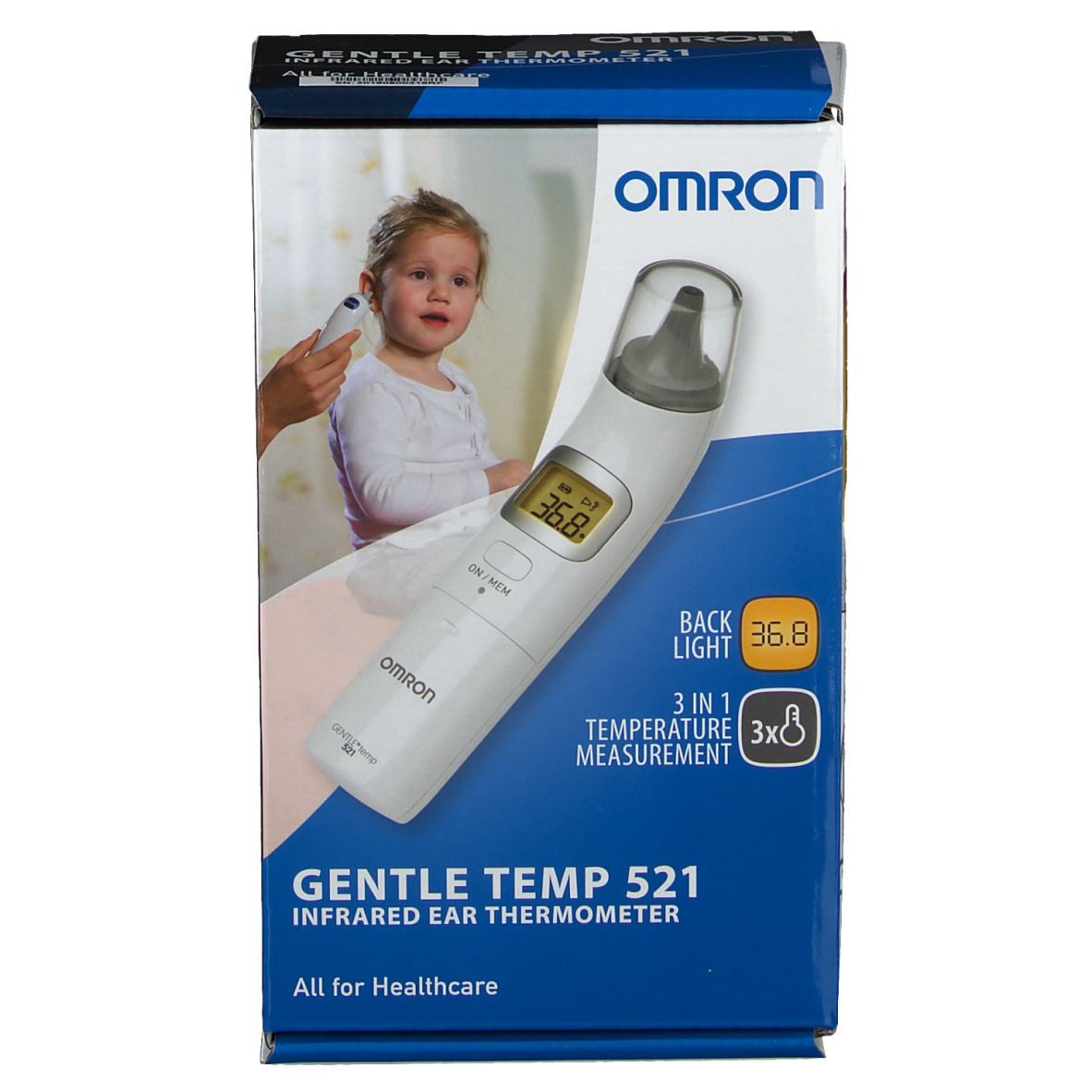 Emballage du thermomètre auriculaire. Boîte bleue et blanche avec image du produit et enfant. Texte: Gentle Temp 521, Omron.