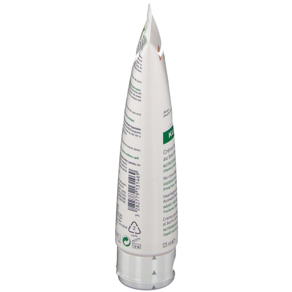 Tube Klorane, vue latérale. Blanc, avec texte et éléments verts. Impression: informations produit, fabricant, volume.