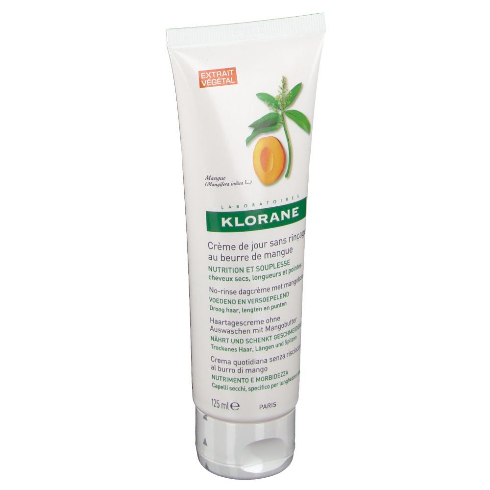 Tube de Klorane Crème de jour sans rinçage au beurre de mangue. Blanc, éléments verts et oranges. Illustration de mangue, Extrait Végétal.