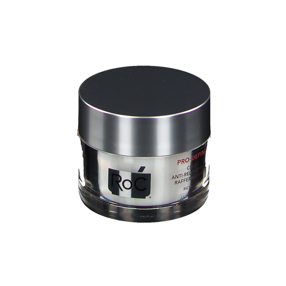 Pot de crème avec couvercle argenté. Logo RoC et nom du produit sur l'étiquette. Récipient transparent avec contenu blanc.
