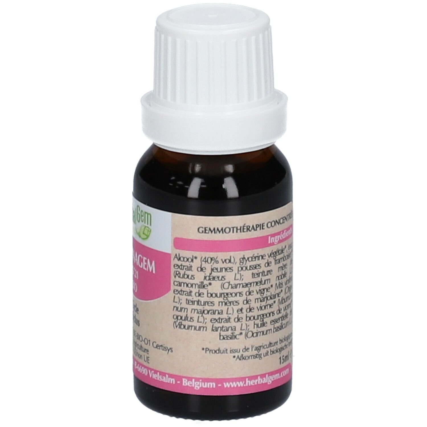 Flacon en verre brun avec bouchon blanc. Étiquette avec ingrédients: alcool, glycérine, framboise, etc. Volume: 15ml. Adresse du fabricant.