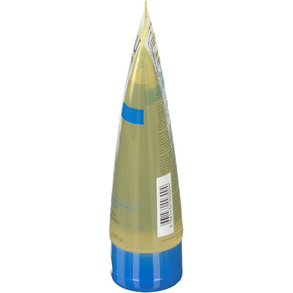 Uriage Xémose. Vista laterale del tubo. Giallo, tappo blu. Codice a barre e testo sul retro.