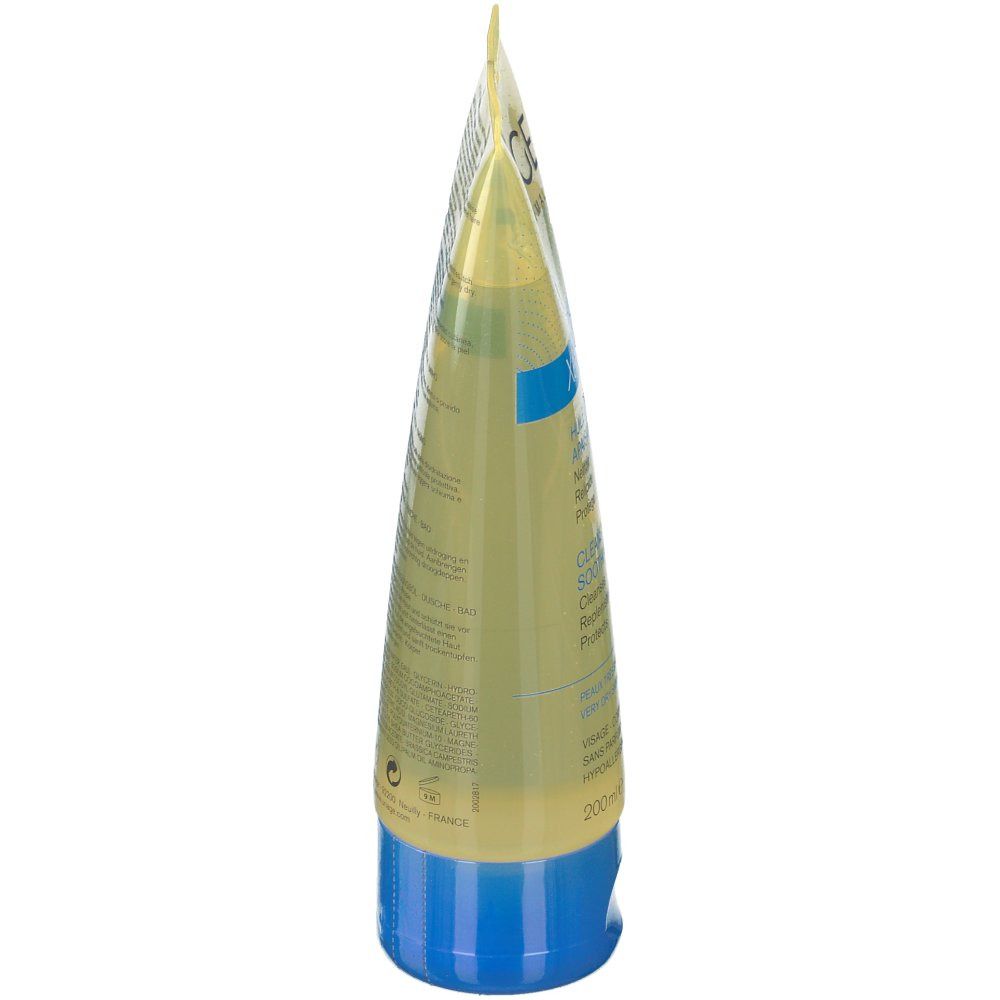 Uriage Xémose. Vista laterale del tubo. Giallo, tappo blu. Testo e codice a barre.