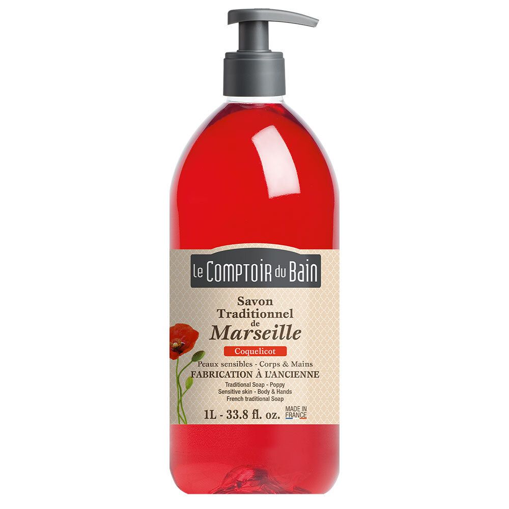 Rode vloeibare zeep in een fles met pomp. Opschrift: Le Comptoir du Bain, Savon de Marseille, Coquelicot.