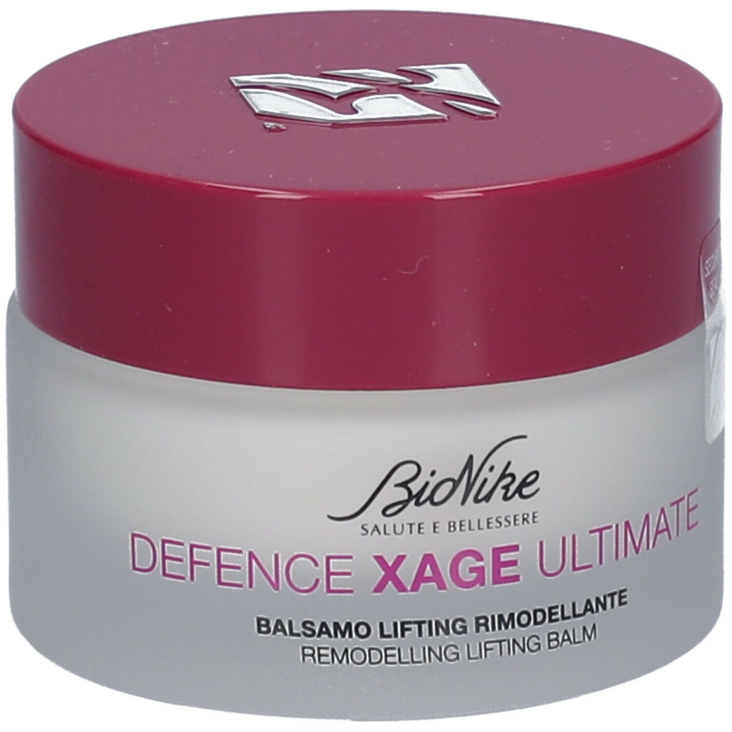 Pot de crème avec couvercle rouge. Inscription: BioNike DEFENCE XAGE ULTIMATE. Balsamo Lifting Rimodellante.
