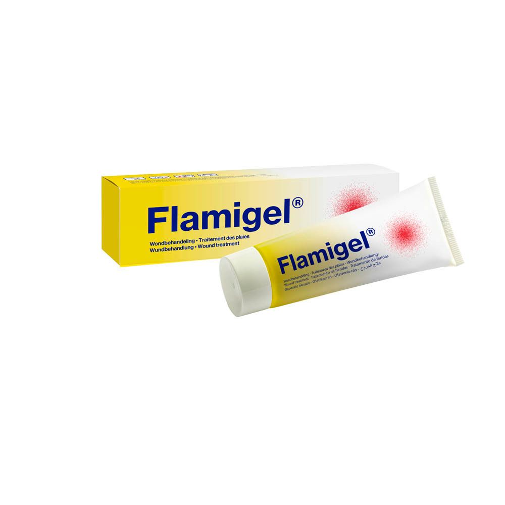 Tube et boîte Flamigel. Emballage jaune et blanc. Tache rouge sur le tube. Texte: Flamigel.