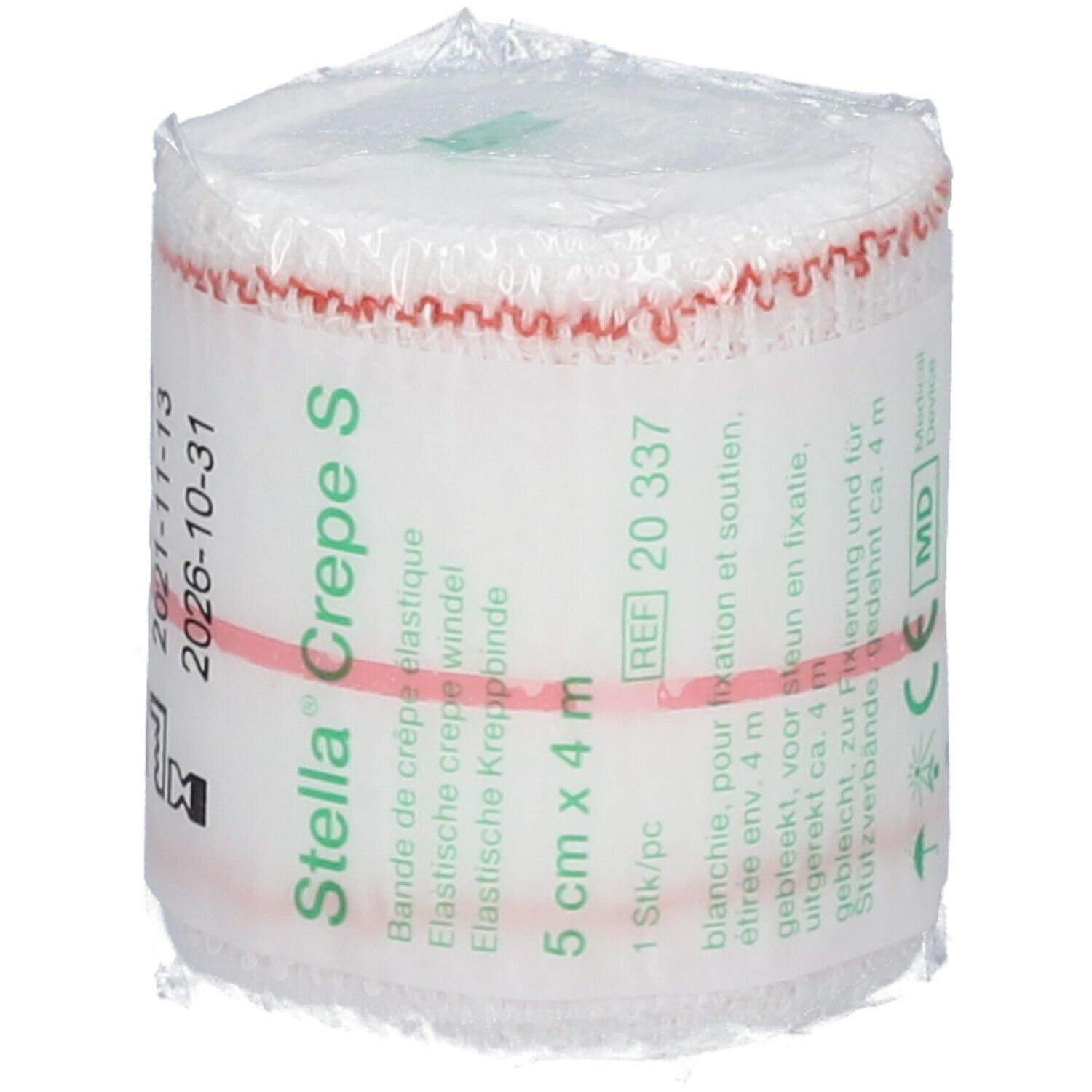 Witte elastische crêpe zwachtel, verpakt. Opschrift: Stella Crepe S, 5 cm x 4 m, REF 20 337, MD.