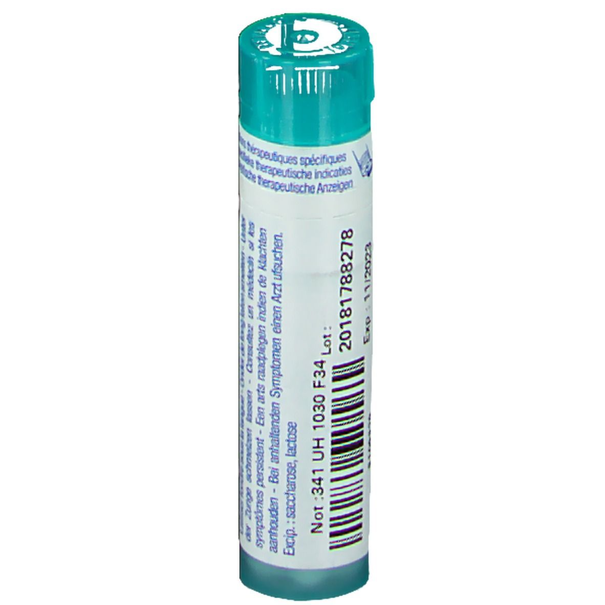 Flacon cylindrique. Étiquette blanche, texte bleu. Bouchon vert. Numéro de lot et date d'expiration.