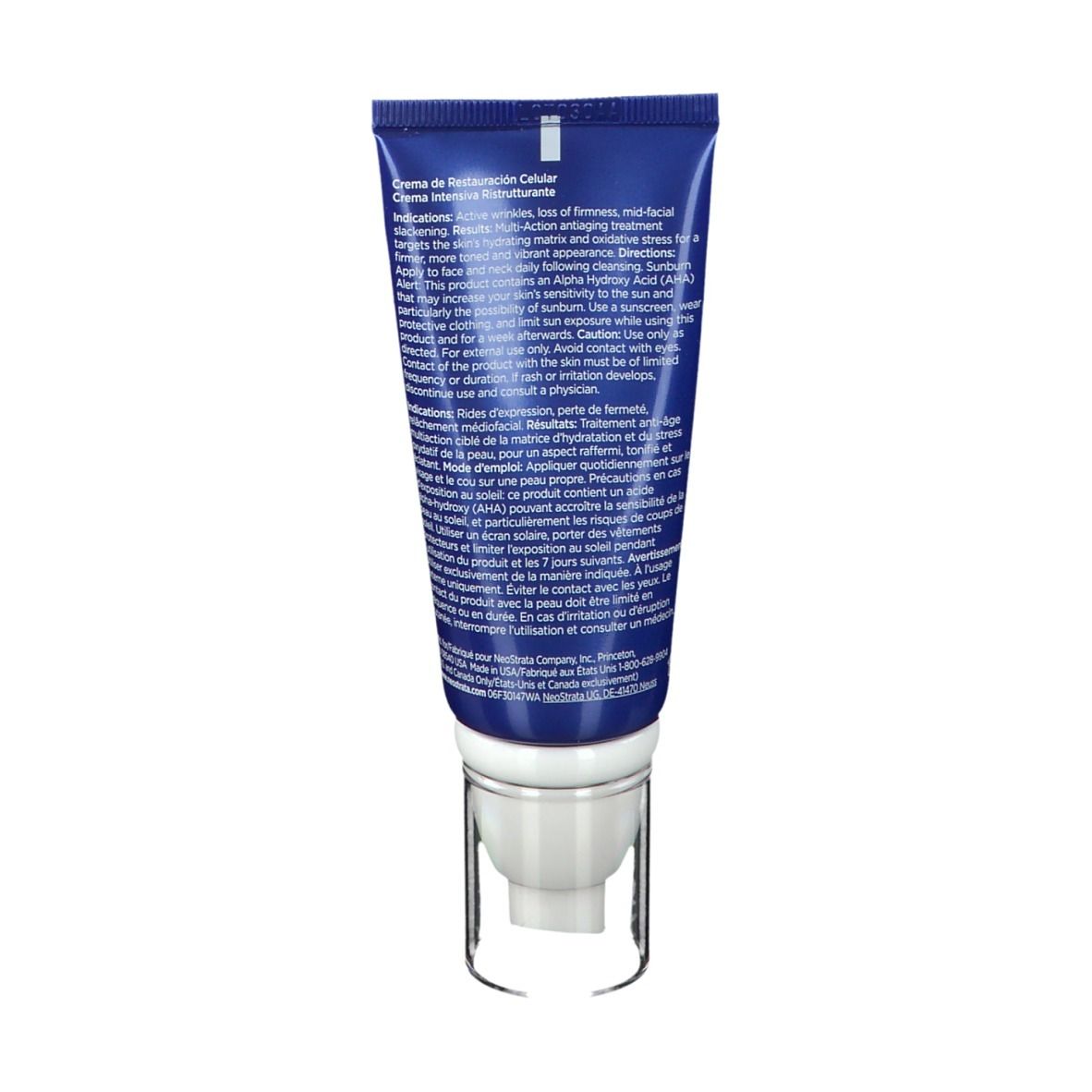 Rückseite der blauen Tube. Text in Englisch und Französisch. Enthält Informationen zum Produkt und Inhaltsstoffe.