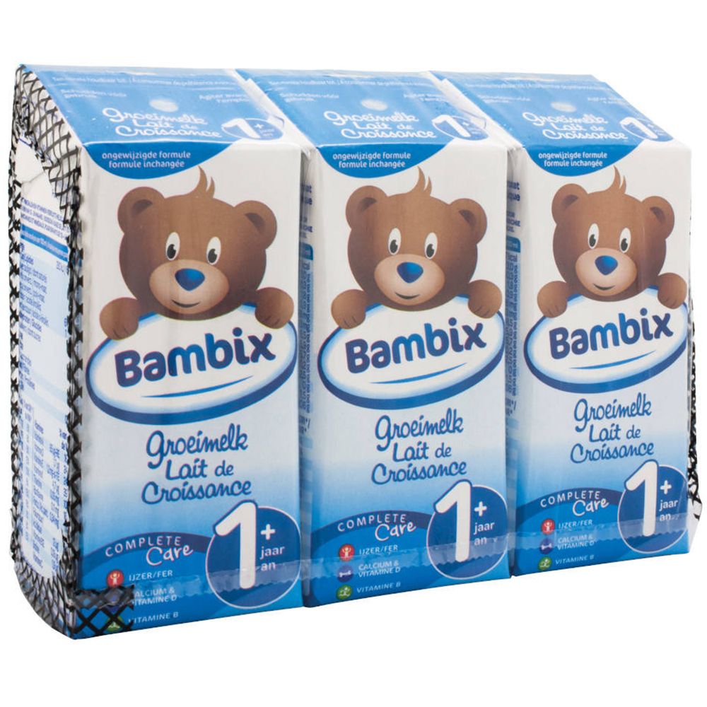 Tre confezioni di Olvarit Bambix Grow Milk +1y. Ogni confezione mostra un orso, il logo e la scritta '1+'.