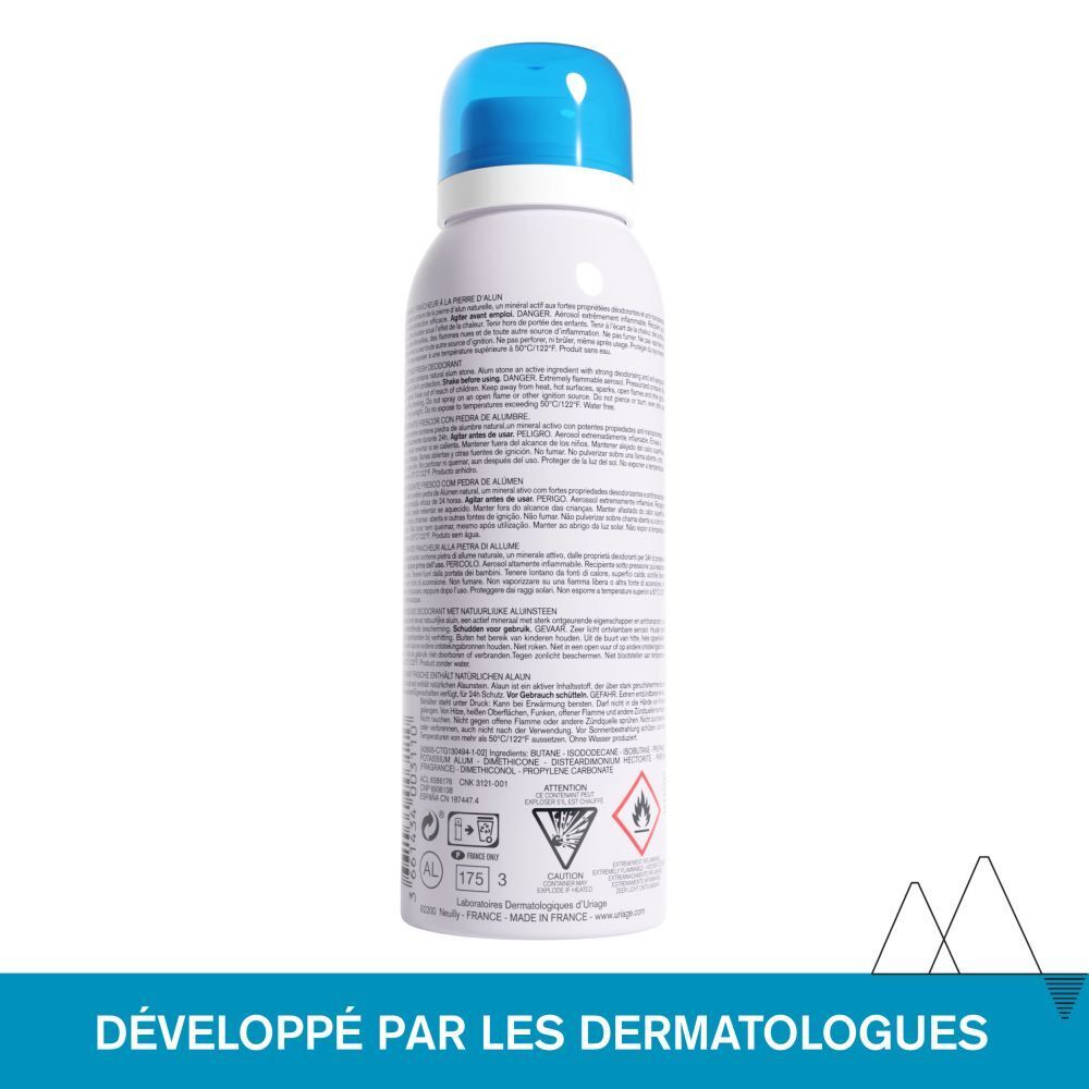 Flacon de spray déodorant blanc avec tête bleue. Nom du produit et texte.