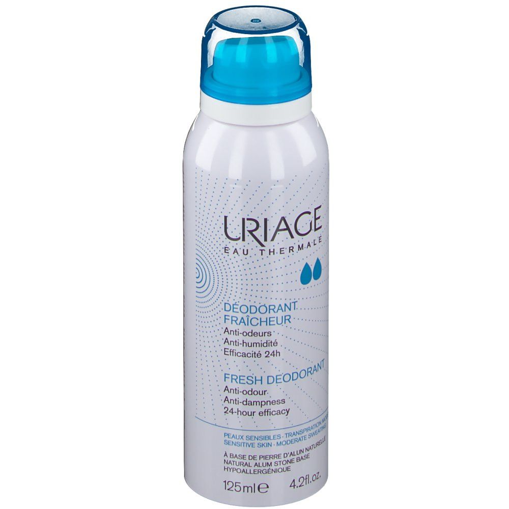 Flacon de spray déodorant blanc avec tête bleue. Nom du produit et texte.