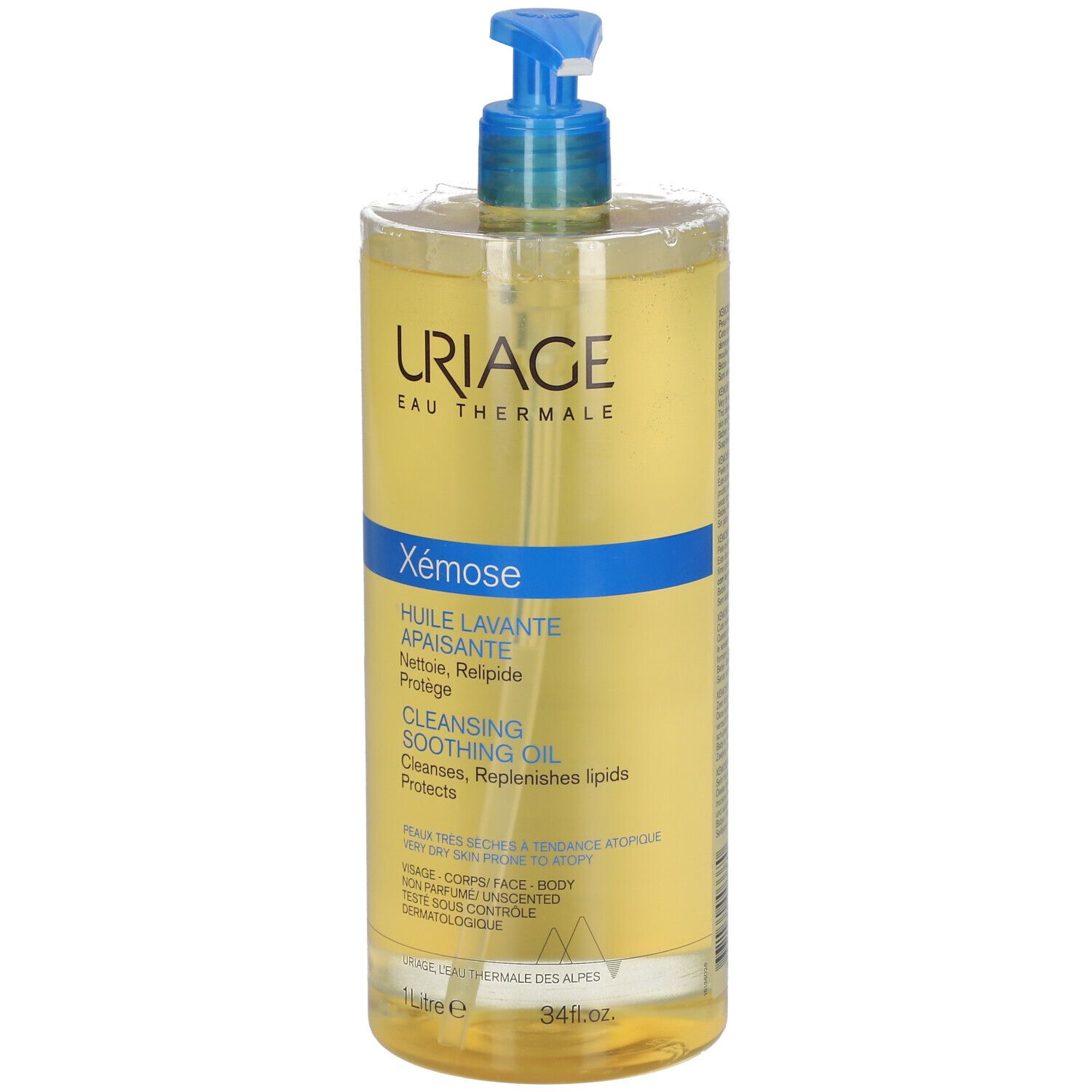 URIAGE EAU THERMALE Xémose. Huile lavante avec bouchon pompe bleu. Liquide clair dans une bouteille.