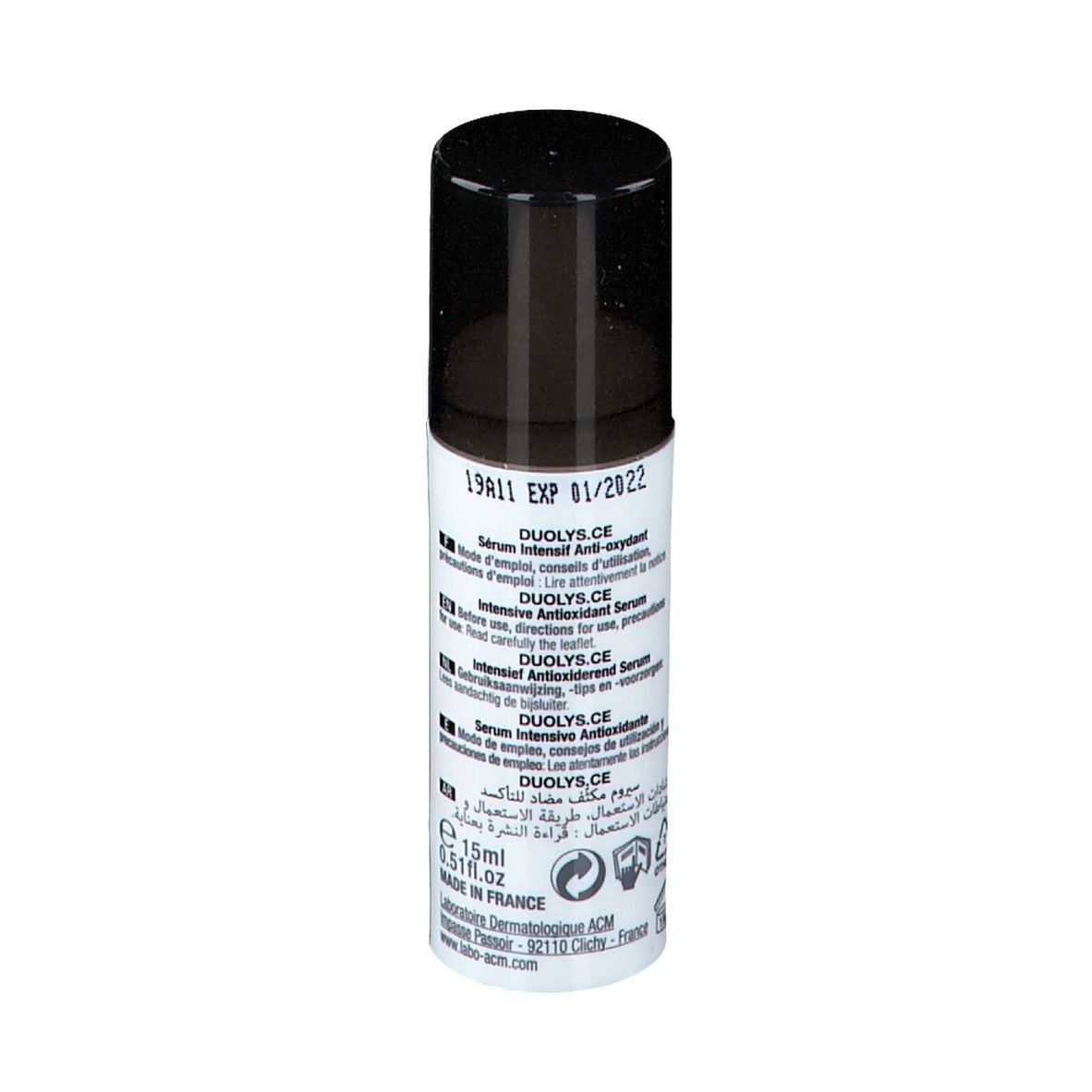 Flacon blanc et noir. Inscription: DUOLYS.CE. Texte multilingue. 15ml. Fabriqué en France.