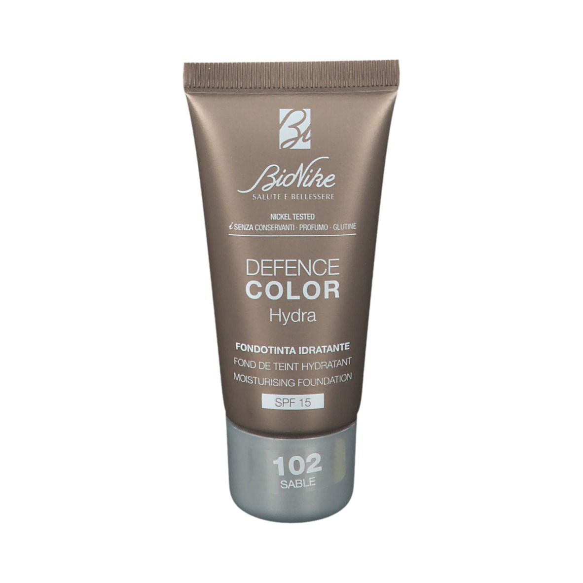 Bruine foundation tube. Opschrift: Defence Color Hydra, 102 Sable, SPF 15. Merk: BioNike.