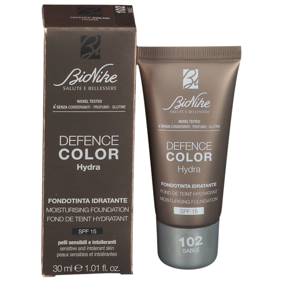 Foundation tube en verpakking. Opschrift: Defence Color Hydra, 102 Sable, SPF 15. Merk: BioNike.