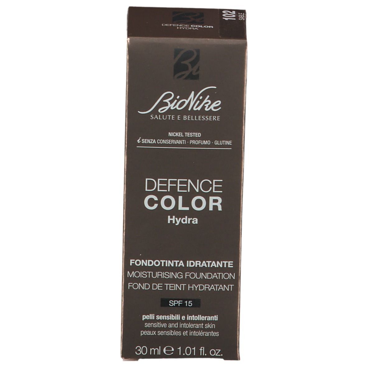 Verpakking met foundation informatie. Opschrift: Defence Color Hydra, 102 Sable, SPF 15. Merk: BioNike.