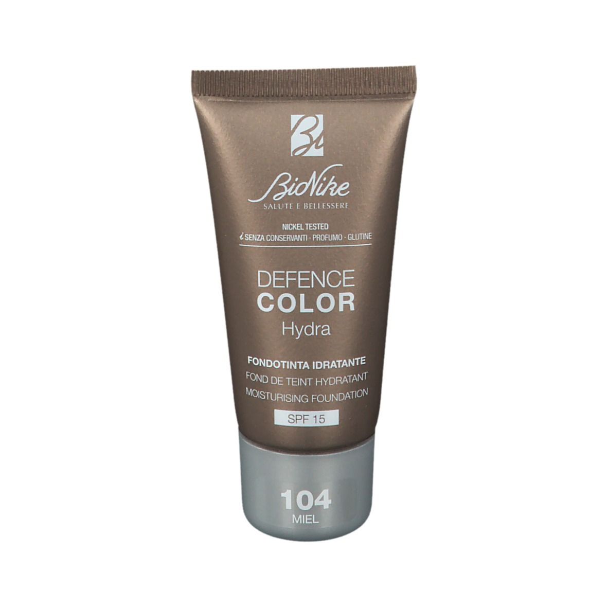 Tube de fond de teint marron. Marque BioNike, Defence Color Hydra. Teinte 104 Miel. Avec SPF 15. Testé au nickel.