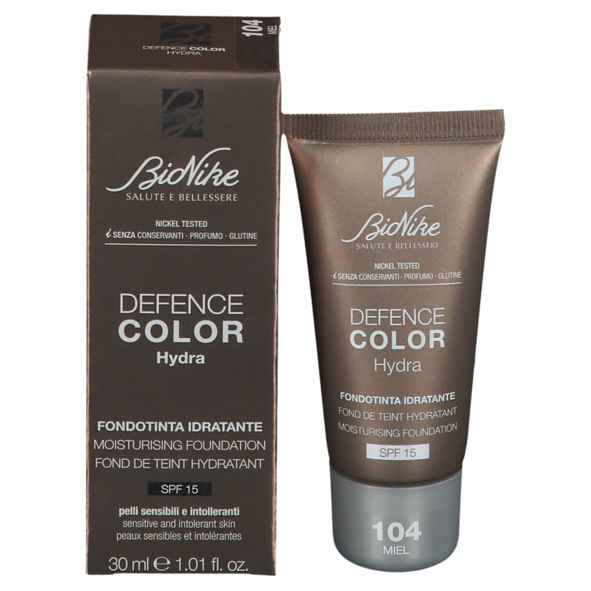 Tube de fond de teint et emballage. Marque BioNike, Defence Color Hydra. Teinte 104 Miel. SPF 15. Testé au nickel.
