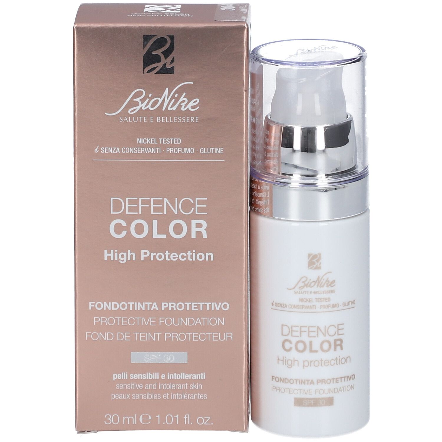 Produktflasche neben einer Verpackung. Aufschrift: DEFENCE COLOR High Protection. SPF30. Verpackung in Rosa.
