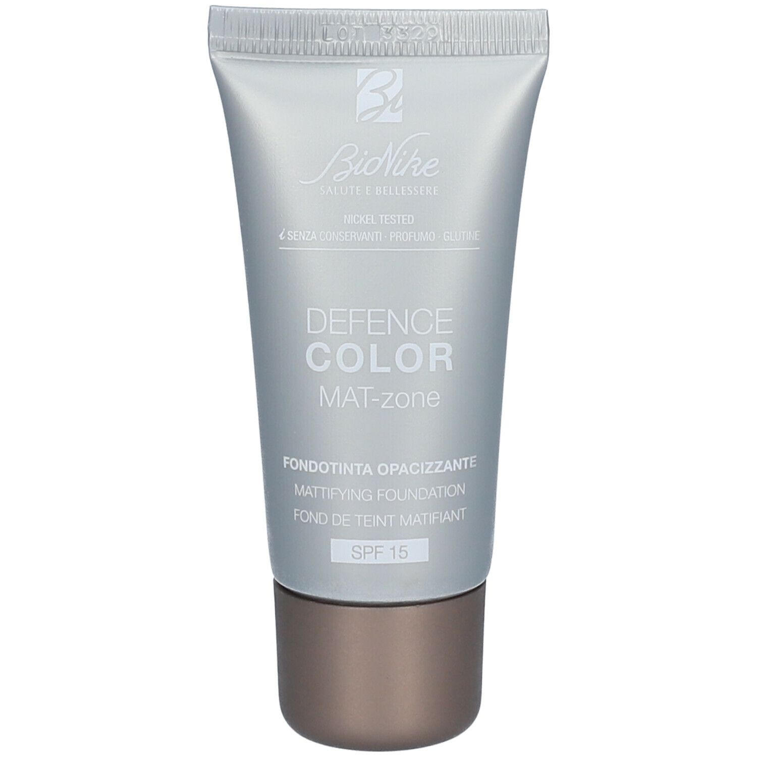 Silberfarbene Tube mit Produkt. Aufschrift: DEFENCE COLOR MAT-zone, SPF 15. Marke: BioNike.