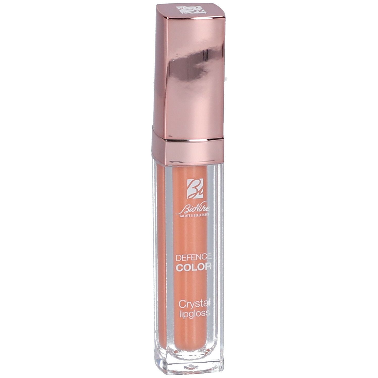 BioNike DEFENCE COLOR Crystal Lipgloss. Boîtier transparent, capuchon or rose. Contenu: gloss pêche.