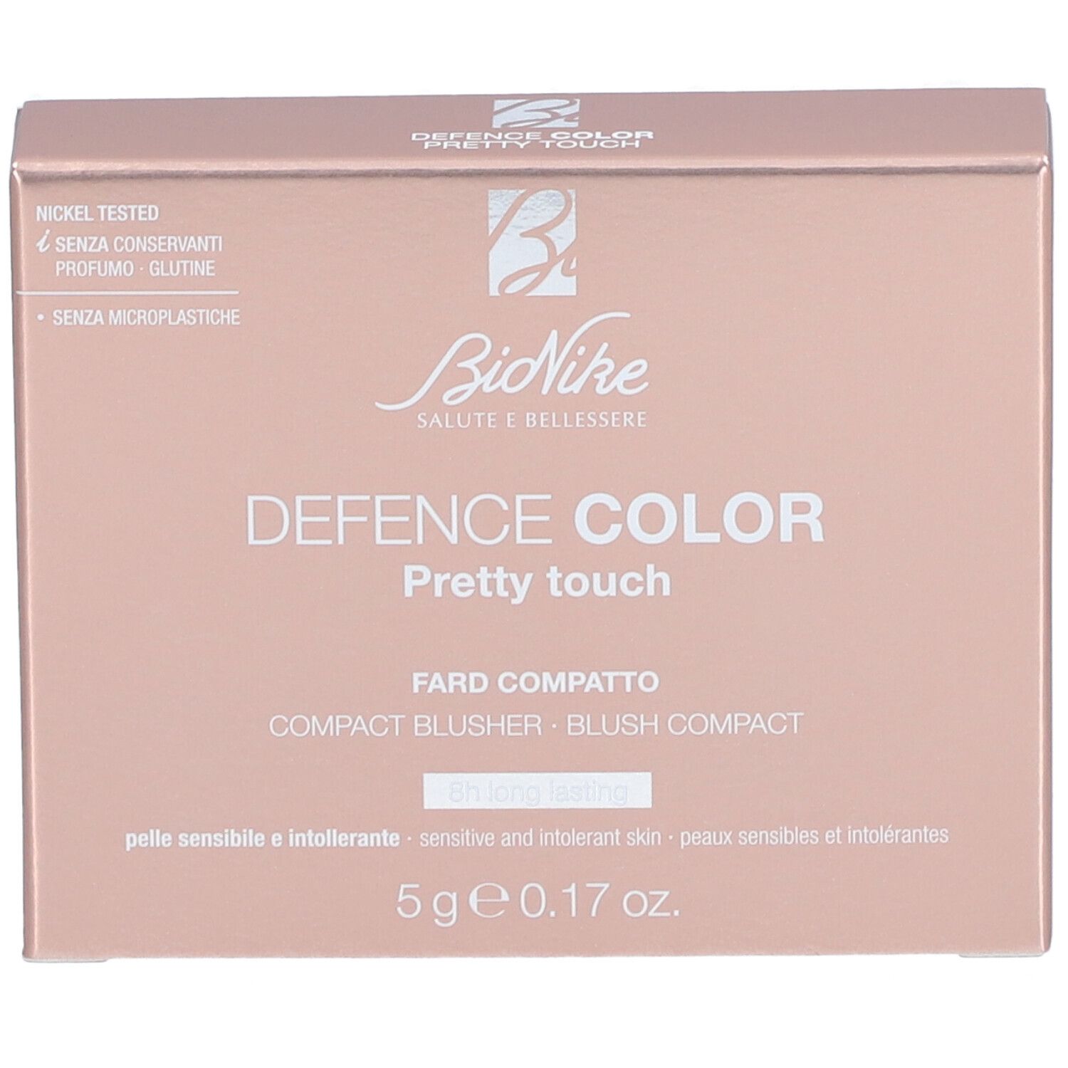 Kompakt-Rouge-Verpackung. Rosa-goldene Schachtel mit Produktnamen und Logo. Text: Nickel getestet, ohne Konservierungsstoffe, Parfum, Gluten.