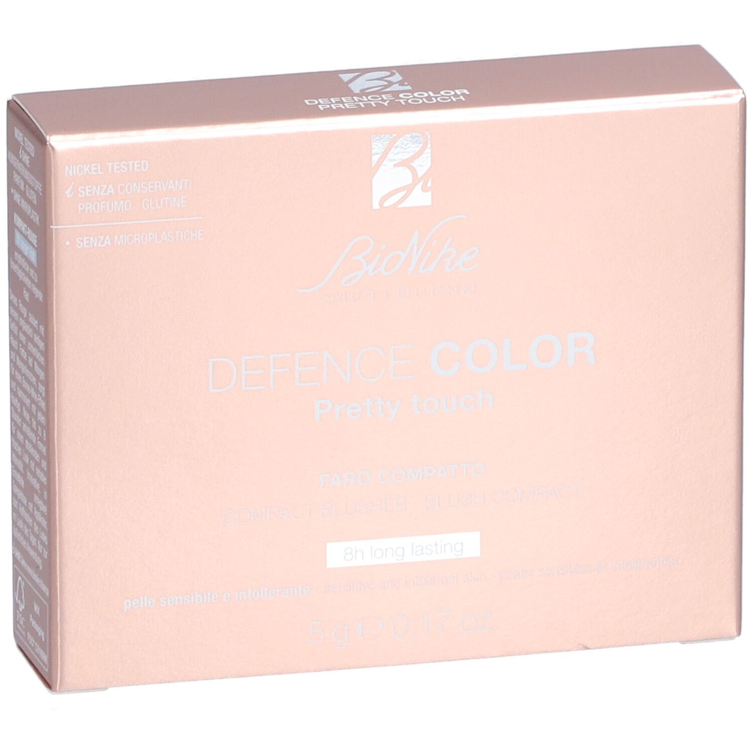Kompakt-Rouge-Verpackung. Rosa-goldene Schachtel mit Produktnamen und Logo. Text: Nickel getestet, ohne Konservierungsstoffe, Parfum, Gluten.