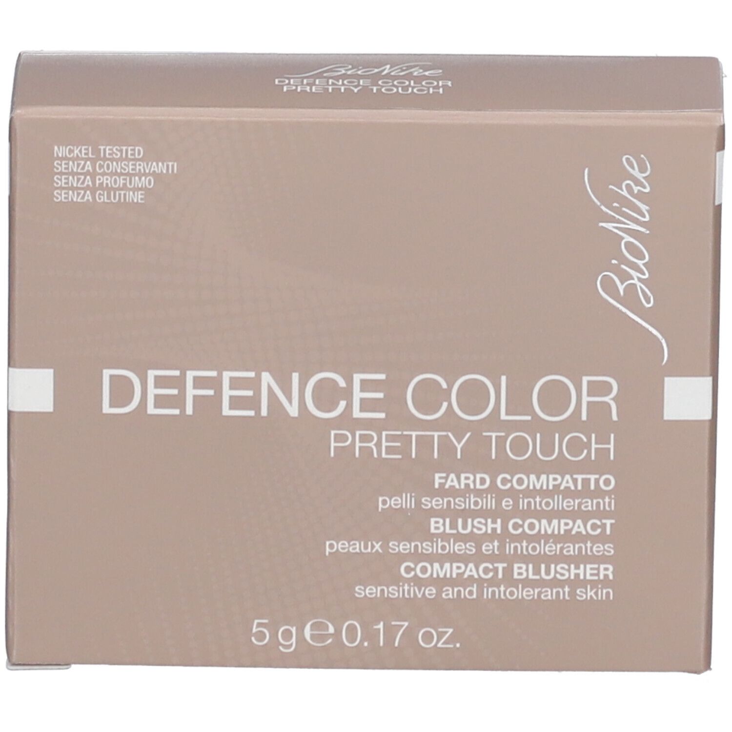Kompakt-Rouge-Verpackung. Rosa-goldene Schachtel mit Produktnamen und Logo. Text: Nickel getestet, ohne Konservierungsstoffe, Parfum, Gluten.