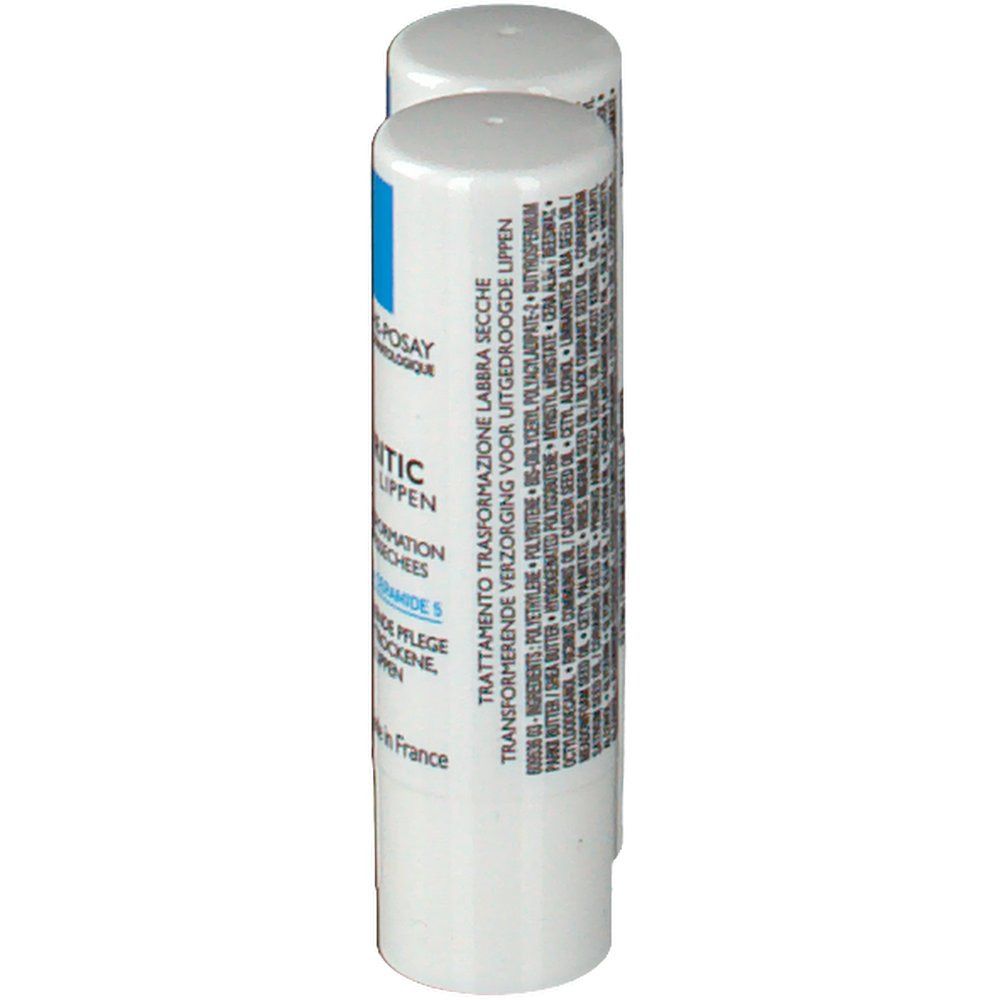Deux sticks à lèvres blancs. Inscription: Nutritic Lèvres, Ceramide 5. Ingrédients visibles. Emballage avec texte en plusieurs langues.