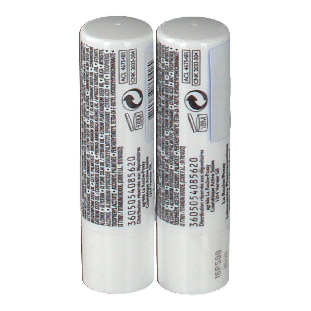 Deux sticks à lèvres blancs. Inscriptions et code-barres. Texte multilingue. Avec date de production et de péremption.