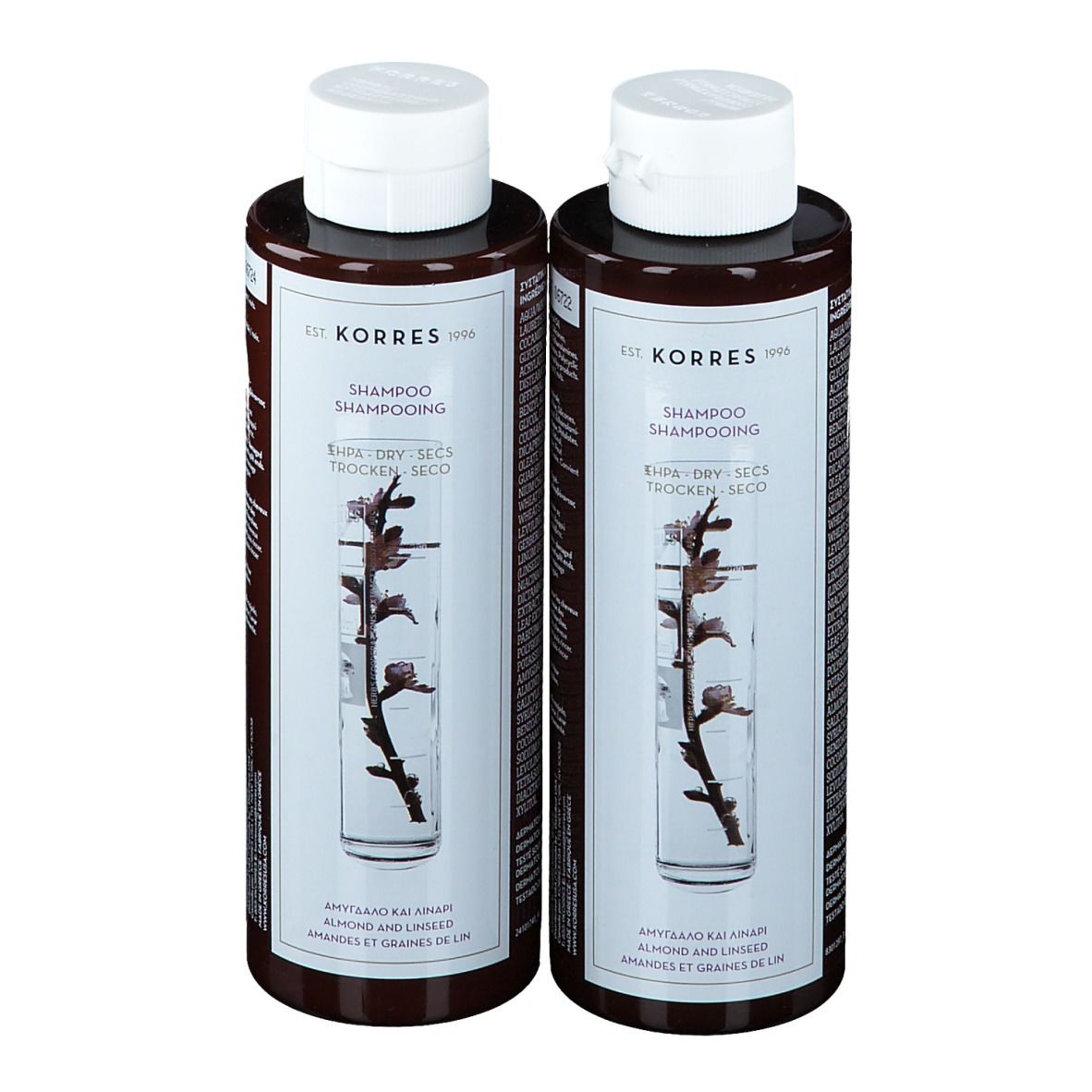 Deux flacons de shampooing bruns avec bouchons blancs. Étiquettes avec informations et logo.