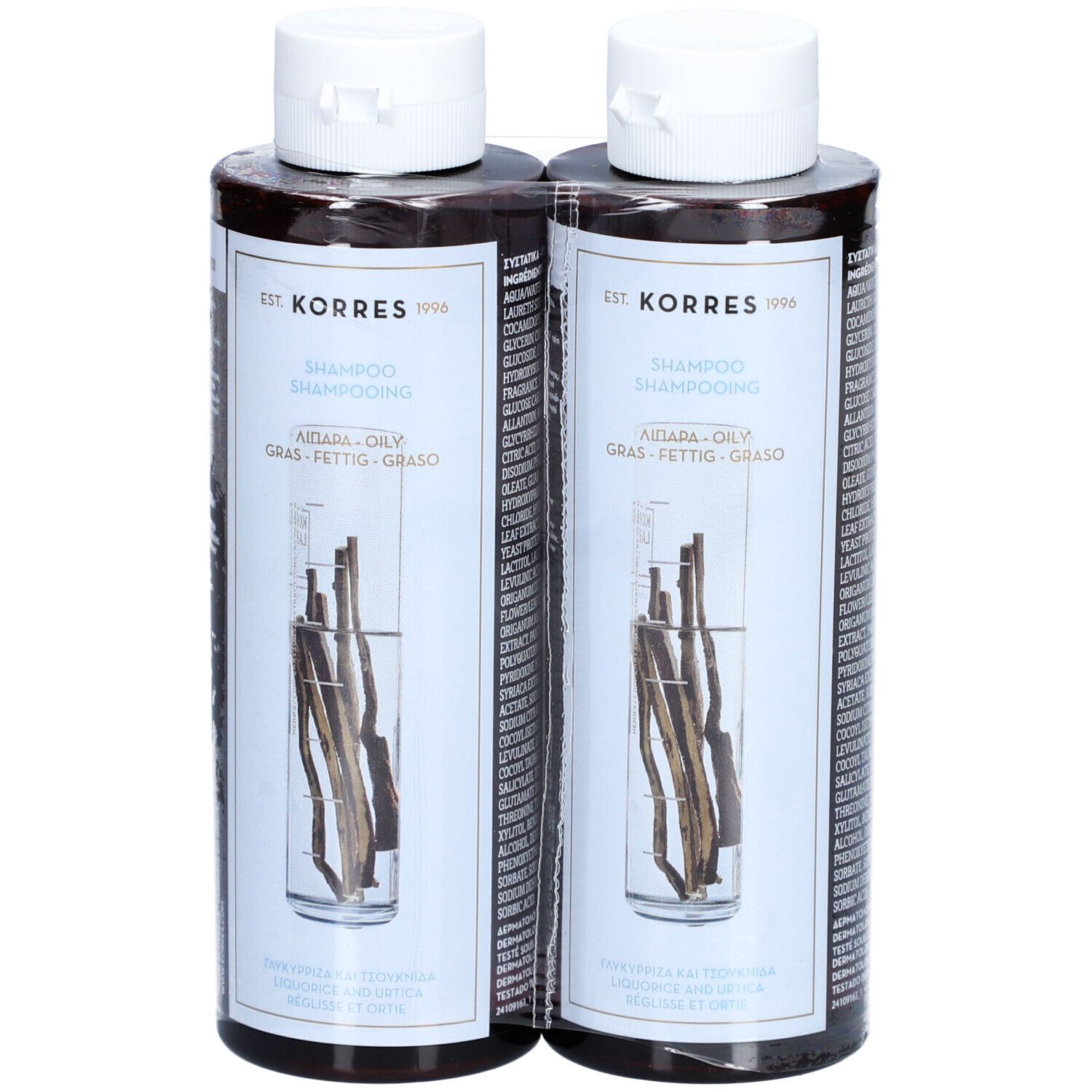 Zwei Shampoo-Flaschen, braune Flüssigkeit, weiße Kappen. Abbildung von Pflanzen in Wasser. Text: KORRES, Shampoo.