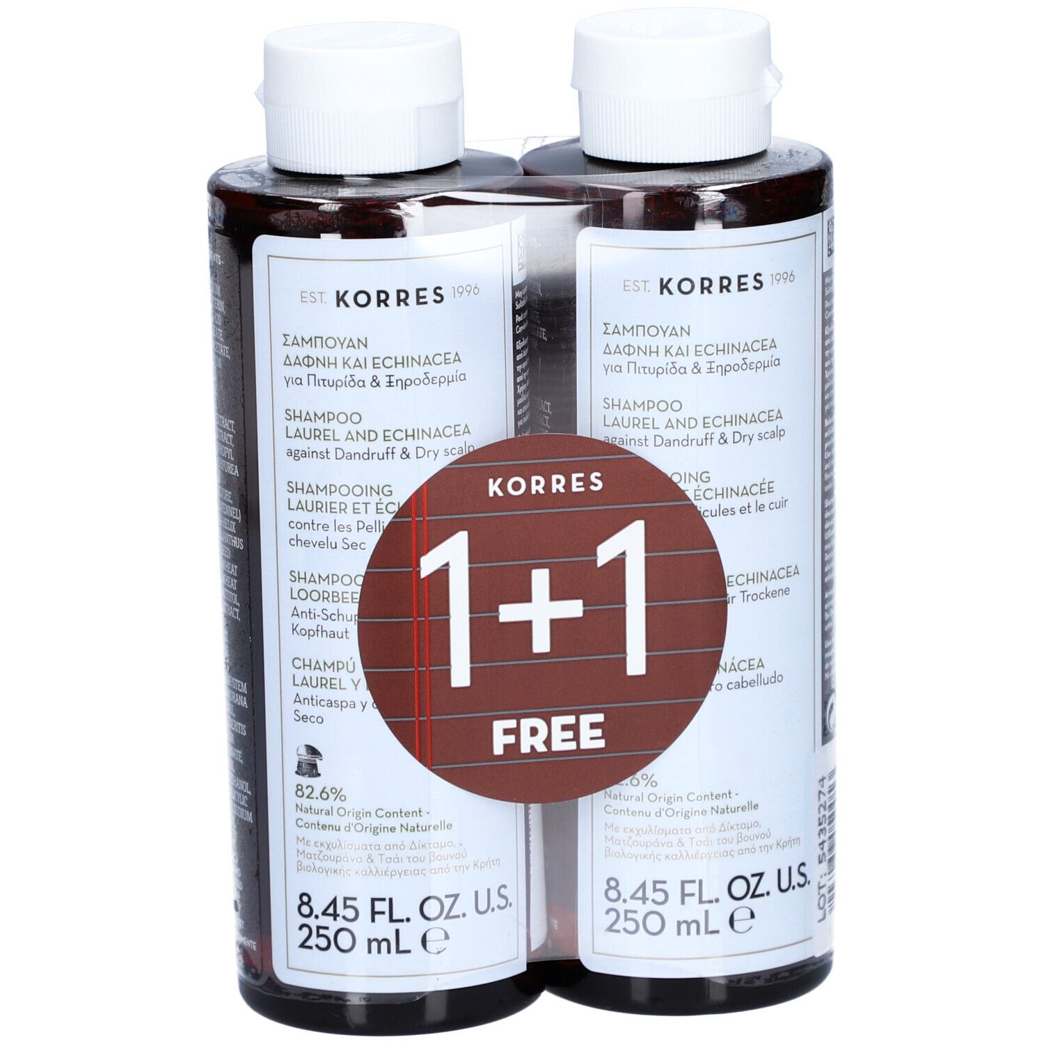 Deux flacons de shampooing marron avec bouchons blancs. Étiquettes avec informations produit et offre "1+1 GRATUIT".