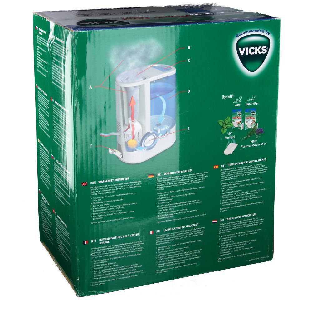 Dos de l'emballage de l'humidificateur Vicks Warm Mist. Diagramme de l'appareil, texte et logo Vicks.
