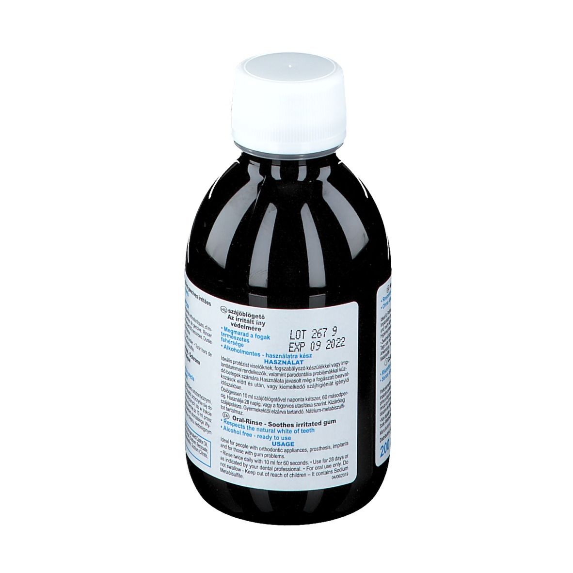 Rückansicht einer Flasche mit dunkler Flüssigkeit und weißem Deckel. Etikett mit Text und Haltbarkeitsdatum.