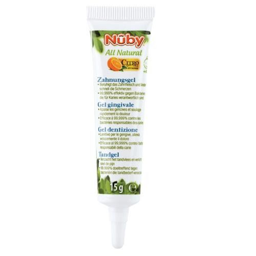 Tube de gel dentaire blanc, motifs verts et oranges. Texte en allemand, français, italien et néerlandais. Marque : Nuby.
