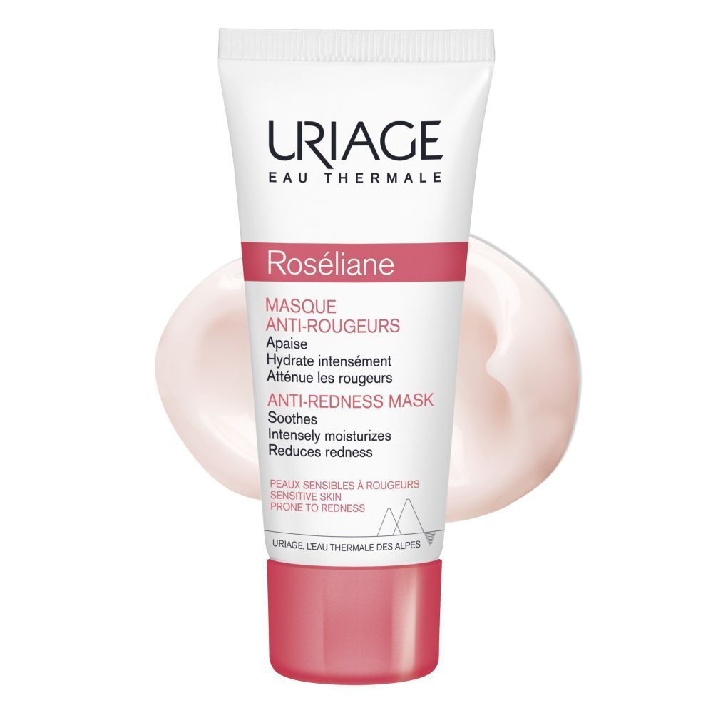 Witte tube met roze dop, Uriage Roséliane Anti-Rougeurs Mask. Product op roze achtergrond.