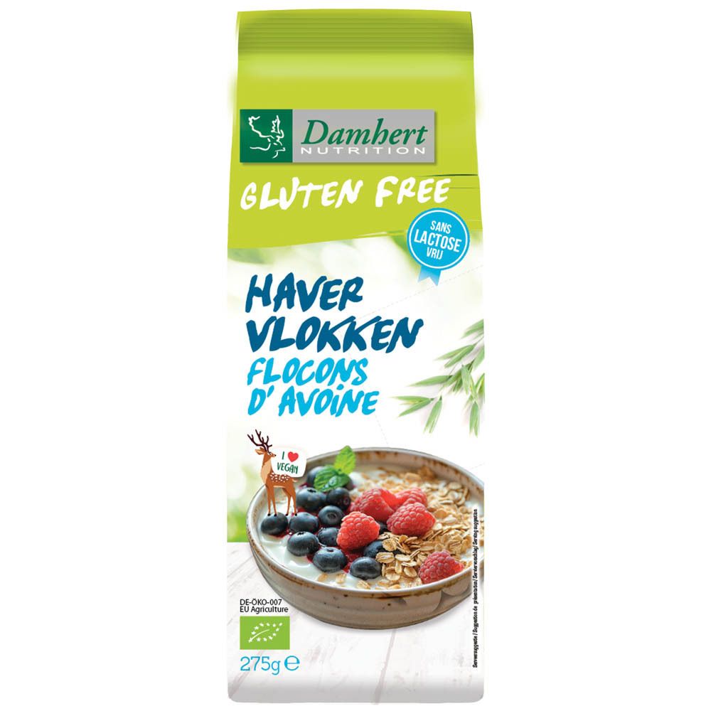Verpackung mit Haferflocken. Aufschrift: Damhert Nutrition, glutenfrei, Haferflocken, Flocken, D'avoine. Mit Früchten dekoriert.