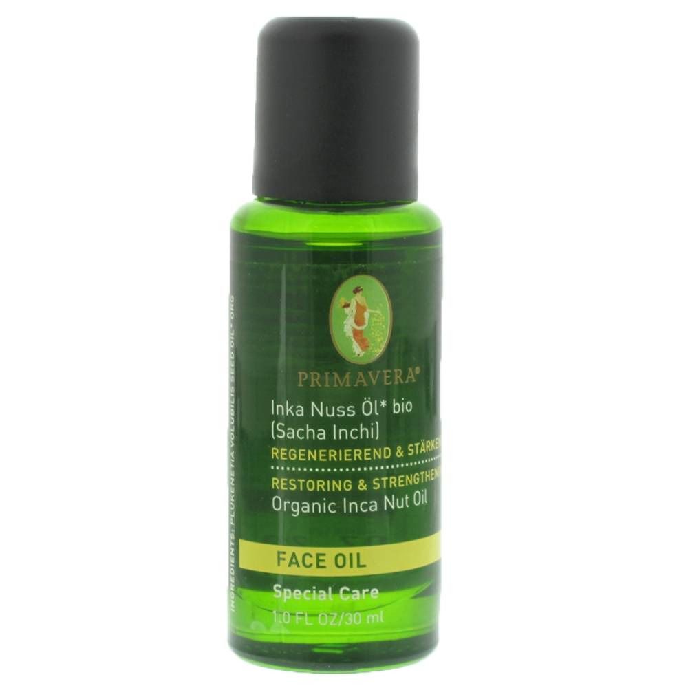 Flacon en verre vert avec bouchon noir. Inscriptions: PRIMAVERA, Inka Nuss Öl bio, Face Oil. Contient 30 ml.
